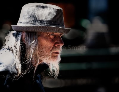 Man in hat at Quay