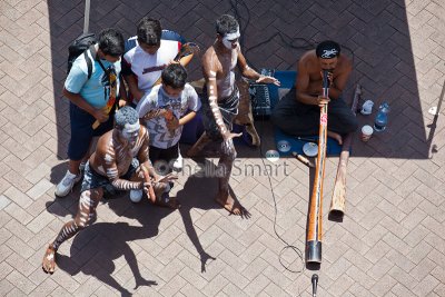 Aboriginal buskers and tourists