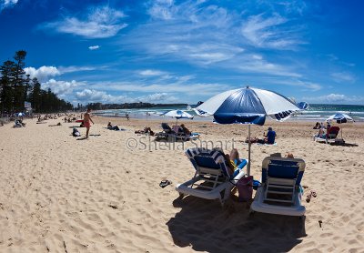 Manly beach with umbrella 