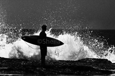 Anticipation - surfer silhouette in black and white