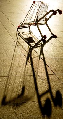 Shopping trolley or shopping cart silhouette and shadow