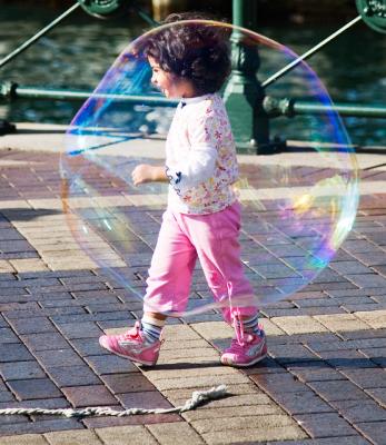 Little girl in a bubble