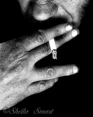 Hands with cigarette