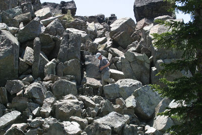 Bill B. in the middle of a big rock pile.
