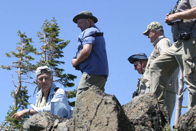 Steve M., Joe W., Tom P., and Ron C. looking over the edge for the Indra Swallowtail.