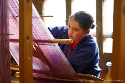 Students learn how to weave