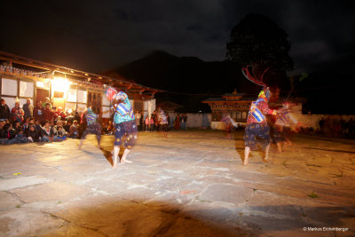 followed by mask dancers