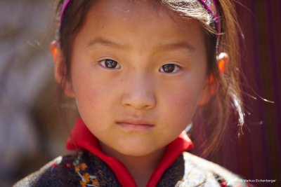 young girl staring at me