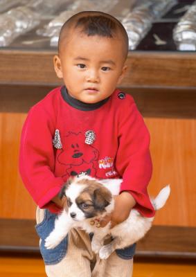 Lijiang Cute Boy With Toy