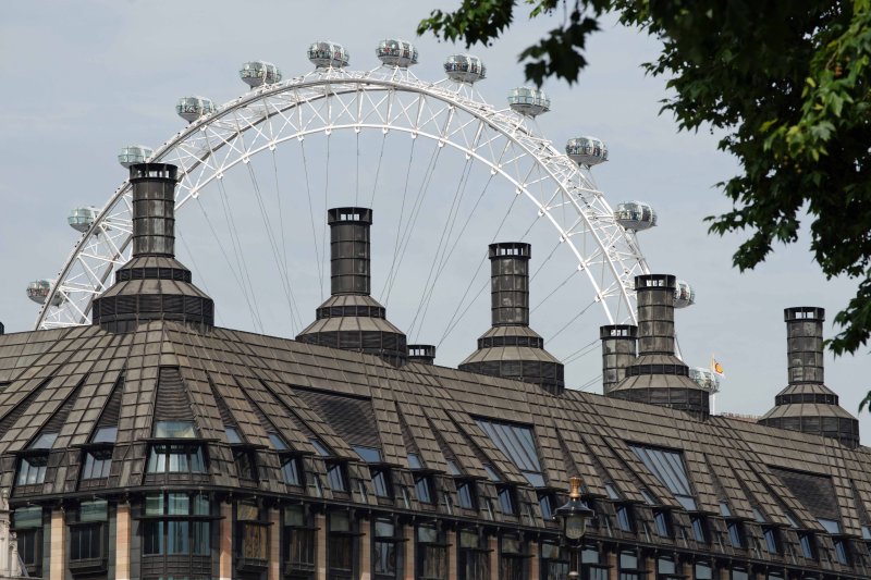 Smokestacks and London Eye London.jpg