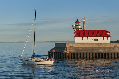 93.31 - Duluth:  Sailboat Leaving Harbor, Shortly Before Sunset