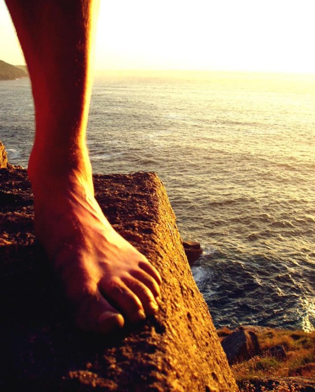 Cornish sun-set on a climber's mangled foot