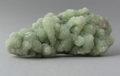 Prehnite cast after Glauberite with Calcite