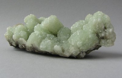 Prehnite cast after Glauberite with Calcite