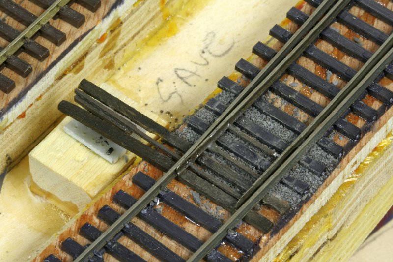 Z-scale throwbars, electrical switch in place