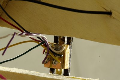 Underneath view of polarity switching slide switch (macro)