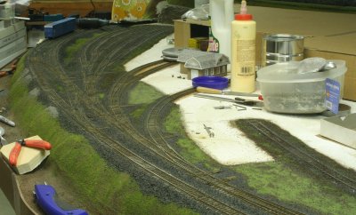 West yard and the sidings up to the paving and grade crossings now ballasted.