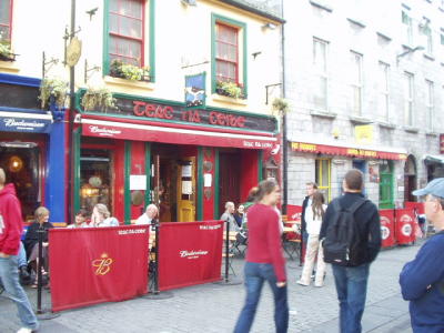 Next door to The Quays.  We sampled here, too.  Note the advertisements for the best-selling lager beer in Ireland.