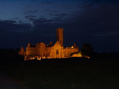 Quin Abbey by night, walking home from the pub.  Note dusk still visible in western sky at 11:00 p.m.