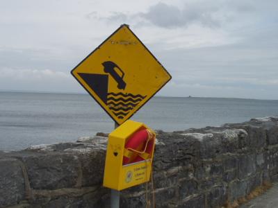 Irish road sign humor:  Caution!  Amphibious vehicles only beyond this point!