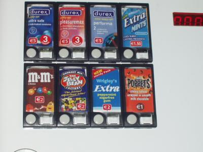 If you can only have one vending machine in a restroom, it should have it all...candy...gum...mints...condoms...no soft drinks?