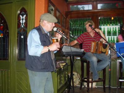Audience participation is encouraged by pub musicians.  Note: holding a pint doesn't always improve one's singing.