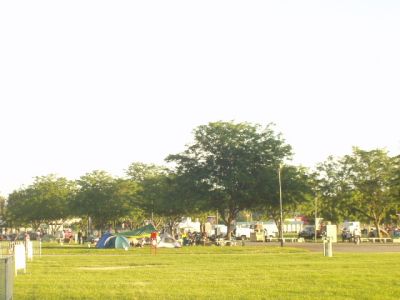 Assorted campers and vendors at the rally.  People put their tents anywhere they could find shade.