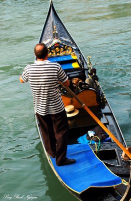 rowing the gondola