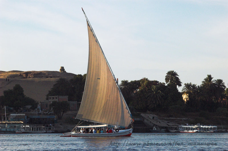Felucca ride with the Tomb of the Aga Khan at the background
