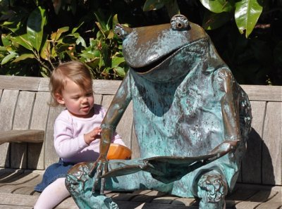 Child with Frog Sculpture