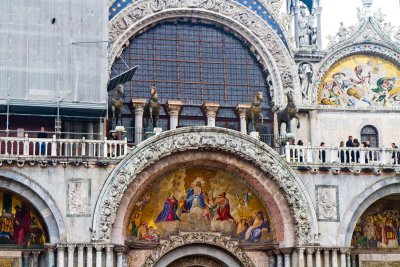 Front detail of St. Mark's with horses and mosaic Christ in Glory