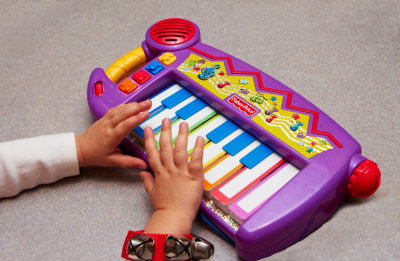 3rd PlaceLittle Hands Learning to Playby Jim