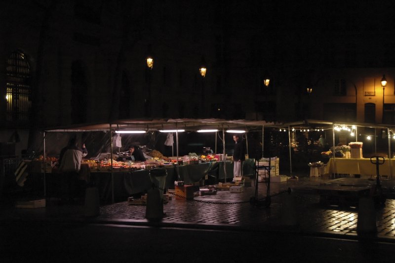 Setting up a produce market near the Marais at 7:30 a.m. on Saturday