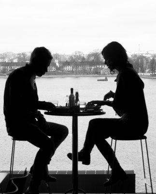 Silhouetted in the window of the cafe at Fotografiska