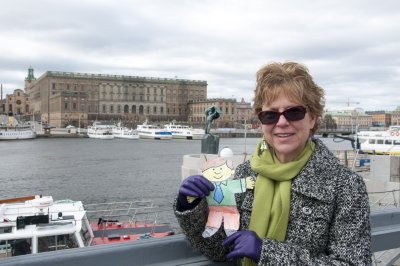 In Stockholm, Sweden, with the Royal Palace in the background