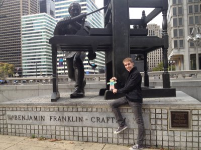 Flat  Stanley and Casey at a sculpture of Ben Franklin and his printing press in Philadelphia