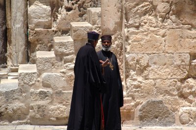 Priests in the courtyard of the Church of the Holy Sepulchre