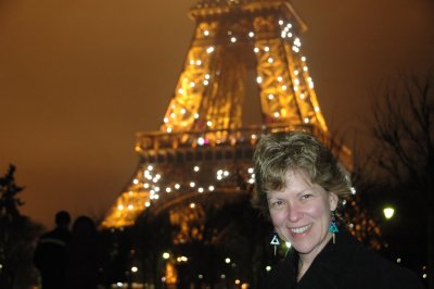 Jill and the Eiffel Tower on a foggy evening