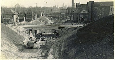 This is an old picture I came across .
It looks like they are digging for the subway here in Toronto.
You are looking south towards the lake from Rosedale or Summerhill.
You can see the LCBO tower in the background.