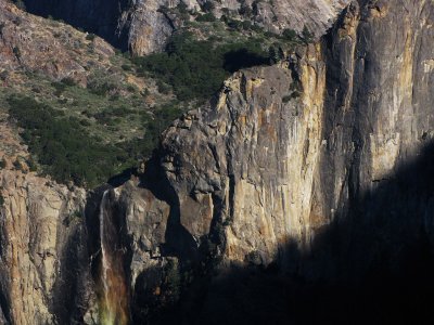 Rainbow'd Bridalveil Fall's top area w/ trees + looming shadow, from Tunnel View. #1736r2