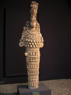 'Great Artemis' headdress hasa temple on top.