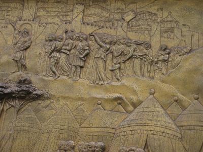 Celebrating fall of Jericho.  Distant figures in low-relief, from previous panel