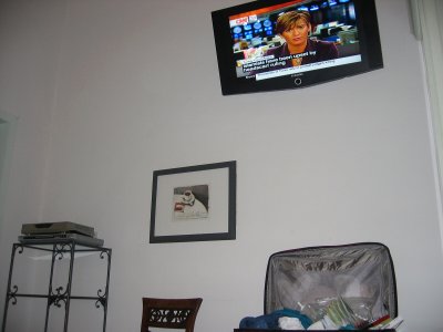 32 TV, DVD-player w/ DVDs, wall safe as painting