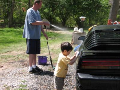 Daddy and Kyle washing the old Firebird