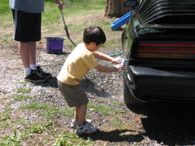 Kyle cleaning the tires