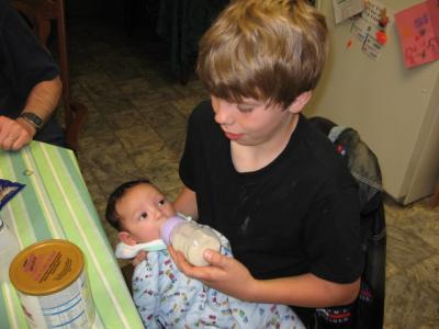 Nick holding baby Noah