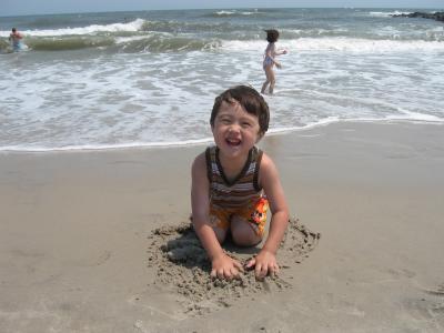 Kyle playing in the sand