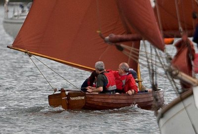 Me sailing Swallow, crossing Nancy's wake (photo credit: John Saxton)