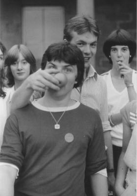 21 Simon Laurence doing something to Robin Hargreave's nose