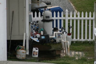 Neighbors hot tub pump spewing water